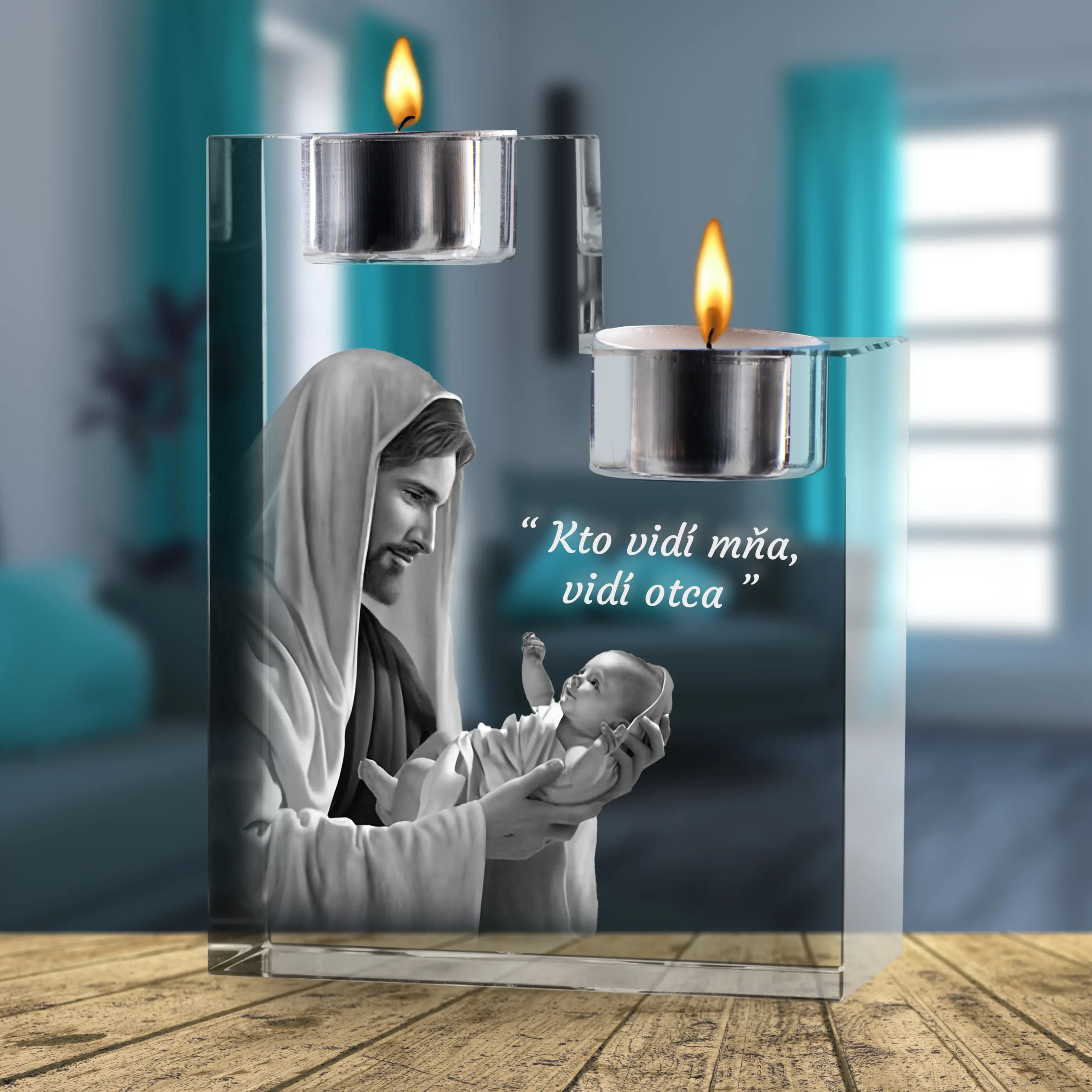 Glass block sculpture with lit candles, featuring a grayscale figure of a man holding a baby, set against a blue backdrop in a memorial display.